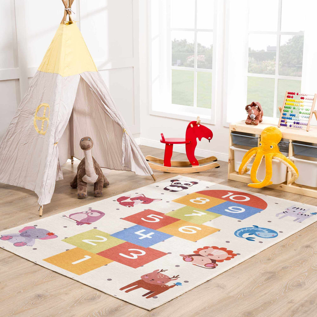 Alfombra lavable para niños con diseño de rayuela colorida